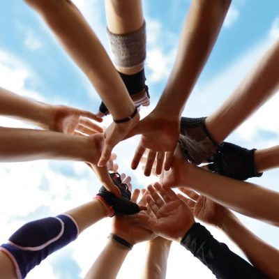 team sport hands up cheerful smiling happy exercise together lifestyle friends love relationship unity people fan hands winners